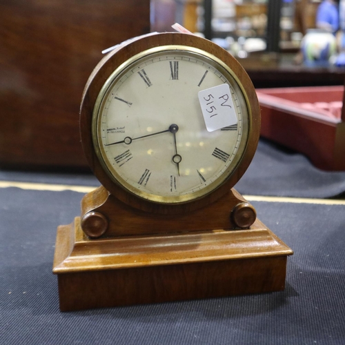 335 - French walnut table clock with key, working at lotting up. Not available for in-house P&P