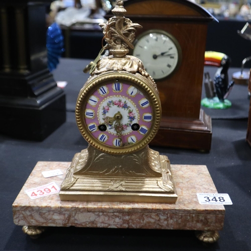 348 - French brass chiming mantel clock with a ceramic face on a marble base, 28CM H. Not available for in... 