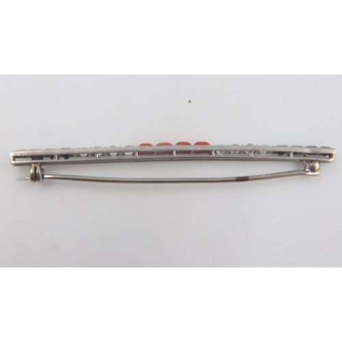 38 - Art Deco platinum coral and old cut diamond onyx bar brooch, 4.1g, L: 60 mm, unmarked. UK P&P Group ... 