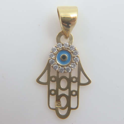 5 - 18ct gold enamel and cubic zirconia hand/eye pendant, 0.8g. UK P&P Group 0 (£6+VAT for the first lot... 