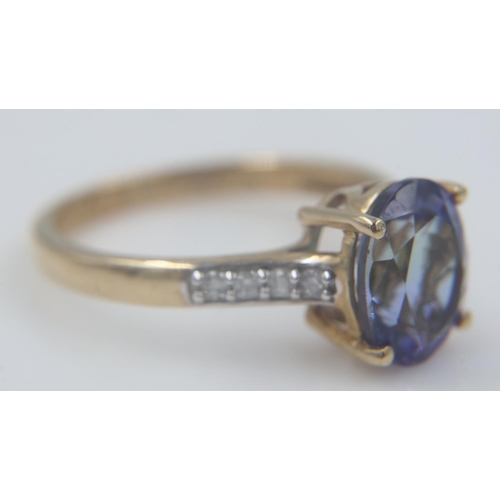 50 - 9ct gold tanzanite and white zircon set ring, size L, 2.2.g UK P&P Group 0 (£6+VAT for the first lot... 