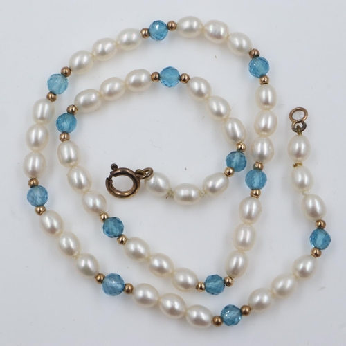 55 - Pearl and facetted aquamarine necklace with 9ct gold clasp and spacers, L: 40 cm. UK P&P Group 0 (£6... 