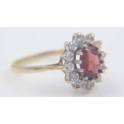 58 - 9ct gold, garnet and cubic zirconia set ring, size O, 2.9g. UK P&P Group 0 (£6+VAT for the first lot... 