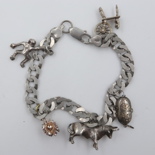 62 - Silver curb link charm bracelet with five charms. UK P&P Group 1 (£16+VAT for the first lot and £2+V... 