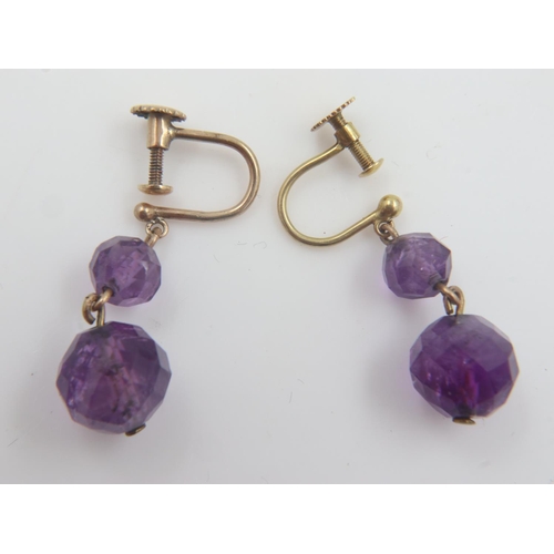 7 - 9ct gold amethyst screw back earrings, 3.8g. UK P&P Group 0 (£6+VAT for the first lot and £1+VAT for... 