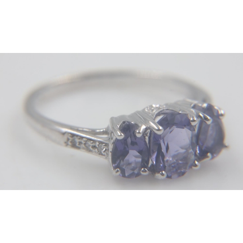 85 - 9ct white gold iolite trilogy ring with diamond set shoulders, size N, 2.7g. UK P&P Group 0 (£6+VAT ... 