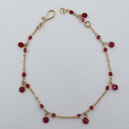 90 - 18ct gold ruby set bracelet, 1.9g. UK P&P Group 0 (£6+VAT for the first lot and £1+VAT for subsequen... 