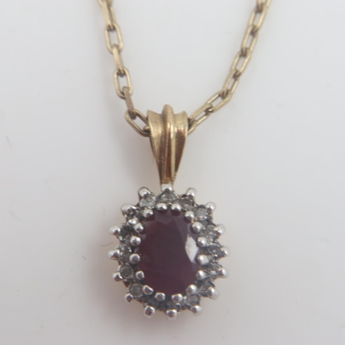 97 - 9ct gold ruby and diamond set pendant on a 9ct gold chain, 3.9g. UK P&P Group 0 (£6+VAT for the firs... 