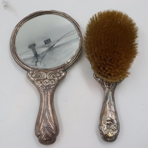 155 - Art Noveau two-piece silver back dressing set, hand mirror and brush. UK P&P Group 2 (£20+VAT for th... 