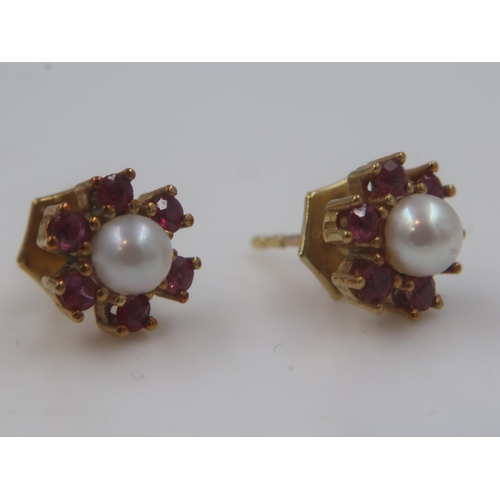 108 - 9ct gold ruby and pearl set stud earrings, 1.7g. UK P&P Group 0 (£6+VAT for the first lot and £1+VAT... 