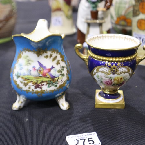 275 - Continental cream jug on tripod supports with Chelsea bird decoration with a twin handled cobalt blu... 