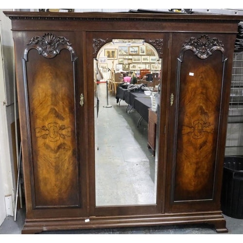 1709D - Substantial 19th century three door flame mahogany wardrobe, interior fitted with drawers and hangin... 