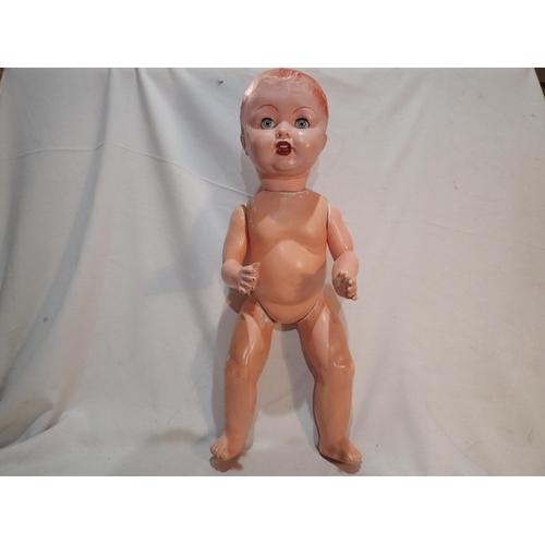 2039 - Large composition doll with sleep eyes, moving head, arms and legs, fair condition, some over painti... 