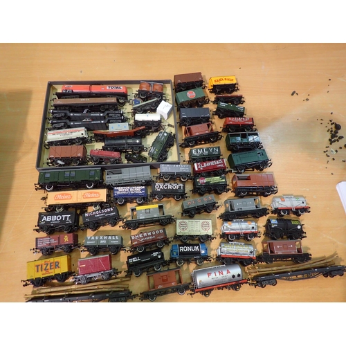 2056 - Approximately fifty OO scale unboxed wagons, various makes and types, mostly very good condition. UK... 