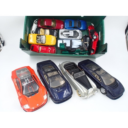 2093 - Eleven unboxed, mixed scale diecast models in very good condition, including Maisto, Mojorette, Corg... 