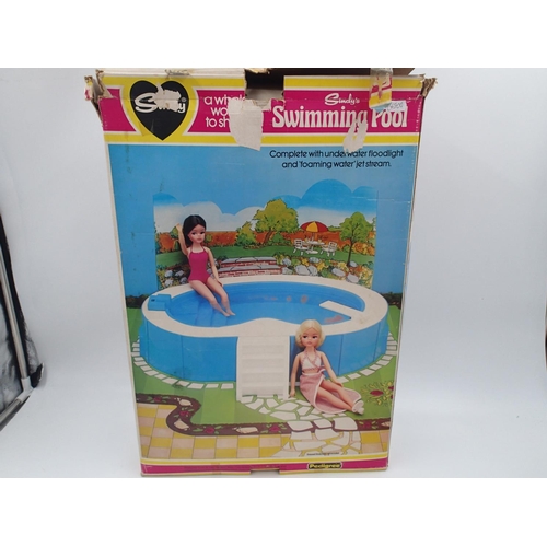 2100 - Three boxed Sindy items, Gig and Horse, Swimming Pool, and Bath, items are in excellent condition wi... 