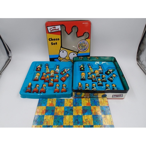 2117 - Official The Simpsons chess set in tin case, complete and excellent condition, some cracks to thin p... 