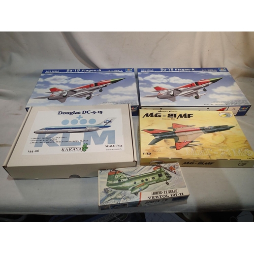 2234 - Five aircraft plastic kits comprising: two Trumpeter 1/72 scale flagons, R.V Aircraft 1/72 scale MIG... 