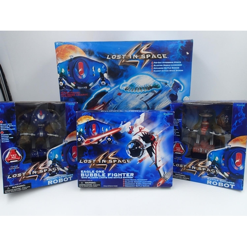 2252 - Four boxed Lost in Space vehicles and robots in excellent condition. UK P&P Group 3 (£30+VAT for the... 