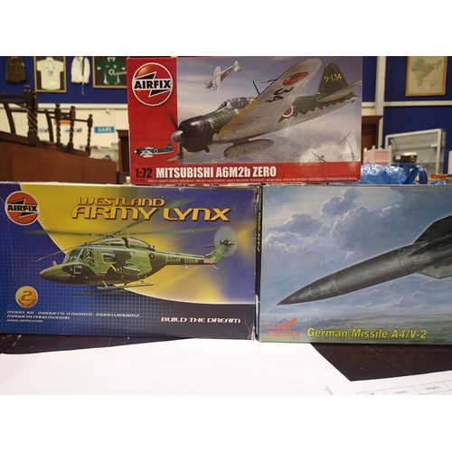 2285 - Three aircraft related kits, 1/72 scale, Airfix Westland Army Lynx, Airfix Zero, Condor V-2 rocket, ... 