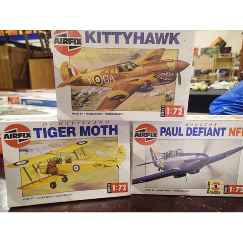 2286 - Three 1/72 scale Airfix aircraft kits, Tiger Moth, Boulton Paul Defiant, and Kittyhawk, appear compl... 