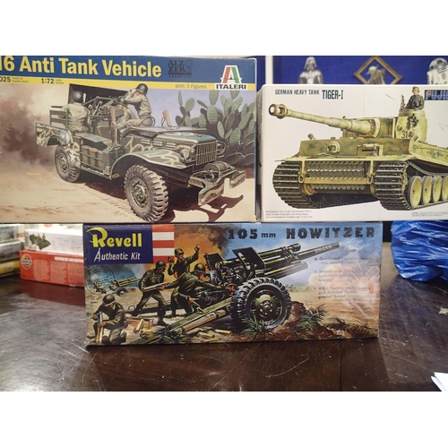 2288 - Three military related kits, Revell 105mm Howitzer, Italeri M6 anti tank vehicle, and Fujimi Tiger 1... 