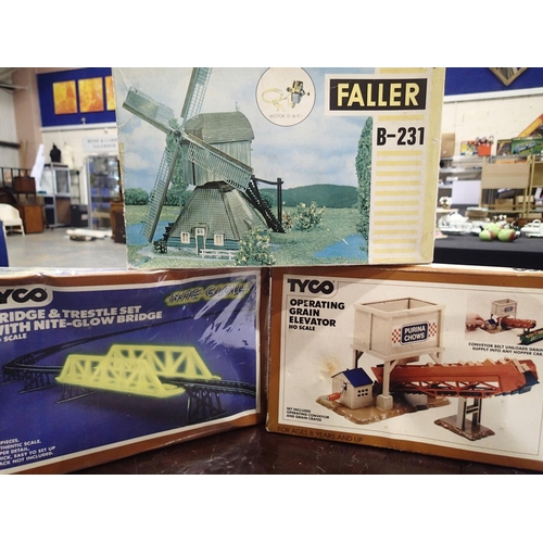 2301 - Three HO/OO scale railway related kits, motorised windmill, operating grain elevator and nite glow b... 