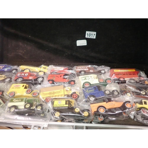 1017 - Twenty loose diecast models in clear bags, contained in an aluminium case. Not available for in-hous... 