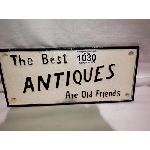 1030 - Cast iron The Best Antiques Are Old Friends sign, W: 25 cm