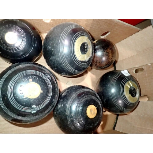 1032 - Two pairs of bowls and two jacks. Not available for in-house P&P