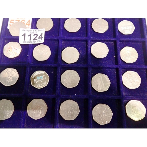 1124 - Twenty commemorative 50p coins in tray. UK P&P Group 1 (£16+VAT for the first lot and £2+VAT for sub... 