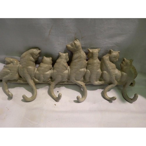 1146 - Cast iron cat tail coat hanger, L: 36 cm. UK P&P Group 2 (£20+VAT for the first lot and £4+VAT for s... 