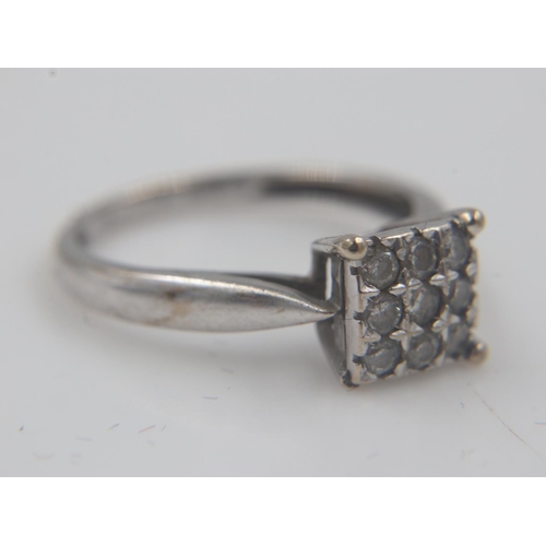 20 - 9ct white gold ring set with nine small diamonds in a square-form setting, size H/I, 1.6g. UK P&P Gr... 