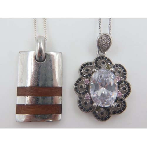 34 - Two 925 silver pendant necklaces, one stone set, one teak-set. UK P&P Group 0 (£6+VAT for the first ... 