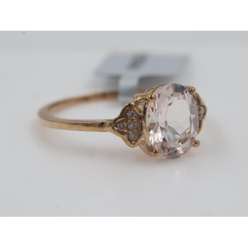 8 - 9ct gold morganite and diamond ring, size Q, 2.1g. UK P&P Group 0 (£6+VAT for the first lot and £1+V... 