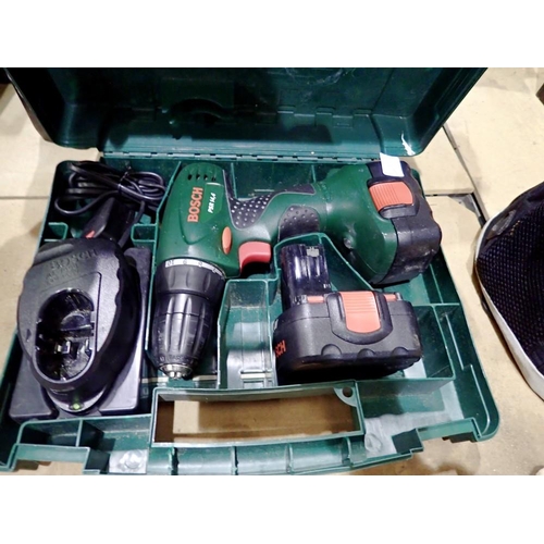 1844 - Bosch PSR 14.4V cordless drill, with two batteries and a charger, working. All electrical items in t... 