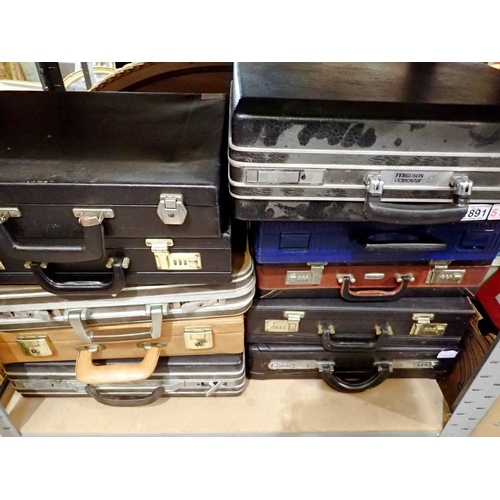 1891 - Ten mixed leather and plastic briefcases. Not available for in-house P&P