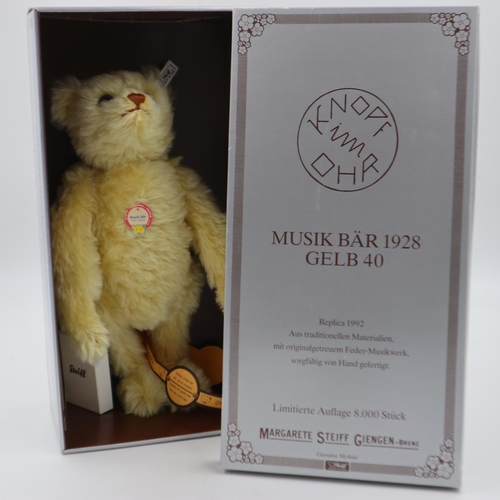 115 - Steiff Musical Bear 1928, yellow, with COA and box, H: 40cm. In good order, no issues noted. UK P&P ... 