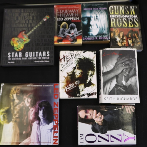 130 - A collection of music themed books with subjects including Guns and Roses, Keith Richards, Led Zeppe... 