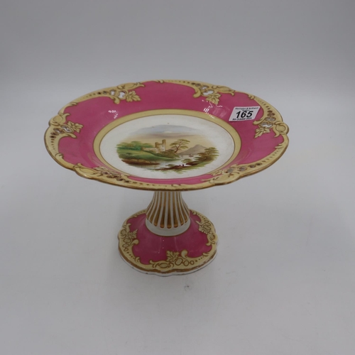 165 - 19th century large comport, decorated in pink and cream with a waterside scene. H: 19cm.  Some minor... 