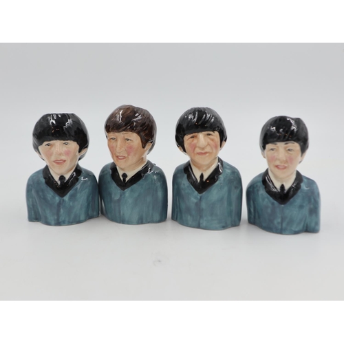 179 - Set of four Beatle Toby jugs, no cracks or chips, each H: 11 cm. UK P&P Group 2 (£20+VAT for the fir... 