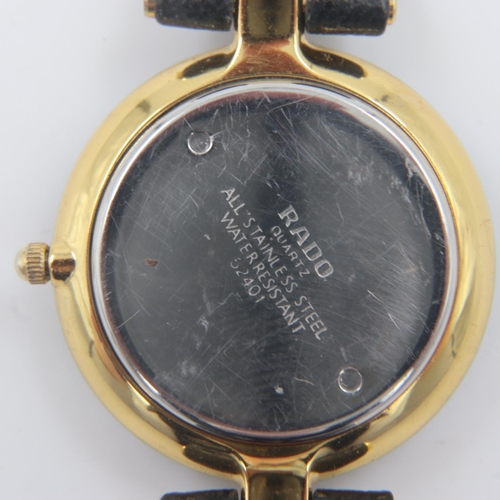 61 - Rado: ladies gold plated wristwatch with date aperture, on leather strap, requires battery. UK P&P G... 