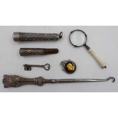 82 - Collection of silver items, including a cheroot holder in case, silver handled button hook, silver r... 