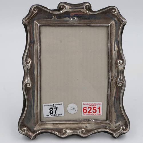 87 - Hallmarked silver easel photograph frame, H: 24 cm. UK P&P Group 2 (£20+VAT for the first lot and £4... 