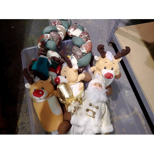 1027 - Collection of decorative items including plush covered storage canisters and  largest Santa figurine... 