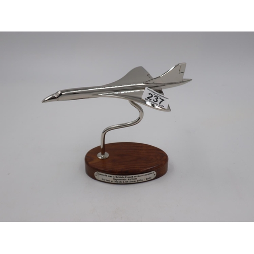 237 - Chrome Concorde on wooden base, L: 23 cm. UK P&P Group 2 (£20+VAT for the first lot and £4+VAT for s... 