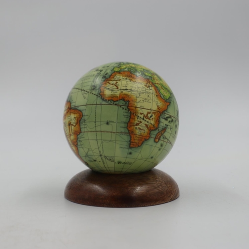 245 - World globe on a wooden base, total H: 12 cm. UK P&P Group 3 (£30+VAT for the first lot and £8+VAT f... 