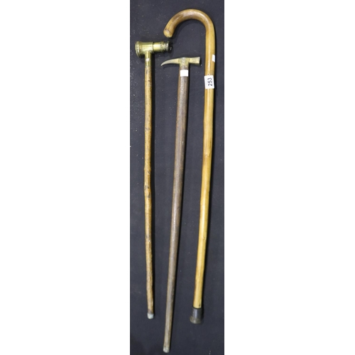 253 - Three walking sticks, including a telescope handled example. UK P&P Group 3 (£30+VAT for the first l... 