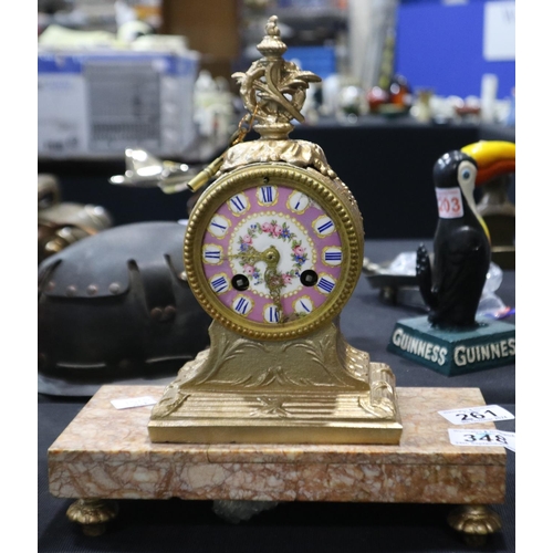 261 - French brass chiming mantel clock with a ceramic dial, on a rouge marble base, H: 28cm. Not availabl... 