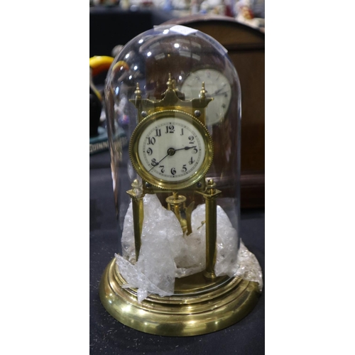 262 - Brass Anniversary clock beneath a glass dome, H: 31cm. Not available for in-house P&P